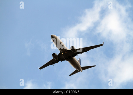 A Continental Airlines airplane flying over the Meadowlands approaching Newark Airport in New Jersey, USA Stock Photo