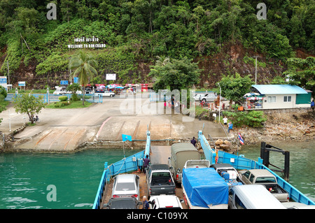 The Koh Chang ferry pier and ferry going to moor at Koh Chang island, Thailand Stock Photo