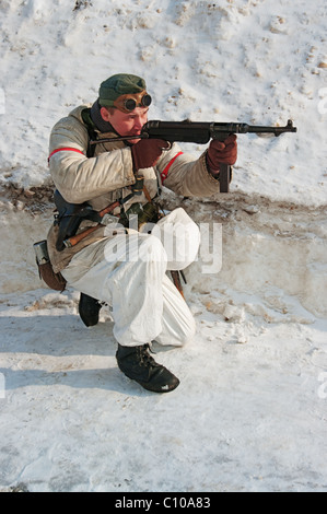 Member of military history club. German soldiers in WW2 winter military uniform.  Historical military reenacting. Stock Photo