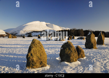 Snow covered Blencathra and Castlerigg Stone Circle in winter in the English Lake District