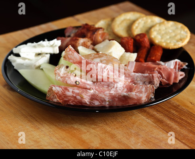Closeup of salami on a buffet plate Stock Photo