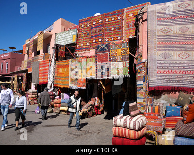 Facade of carpet sellers stores marking the entrance to the carpet souk on Rahba Qedima square Marrakech Morocco Stock Photo