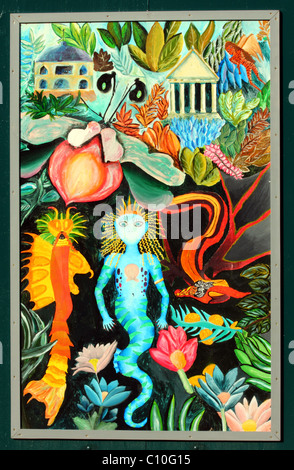 Street Art on Public Display in a regenerated City Center depicting mermaid surreal image Stock Photo