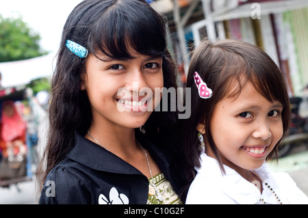 young girls on belakang padang riau islands indonesia Stock Photo