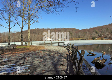 Thawing pond, Cold Spring Harbor, Long Island NY Stock Photo