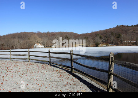 Thawing pond, Cold Spring Harbor, Long Island NY Stock Photo