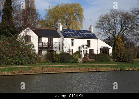 Solar panels on a period house near Cambridge, England, UK Stock Photo