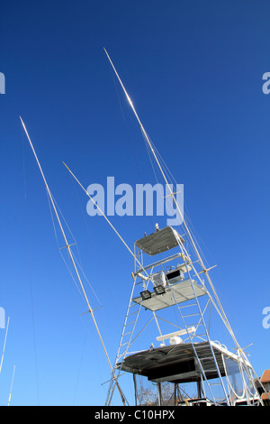 Fly bridge fisher boat high fly bridge tuna tower on blue sky Stock Photo