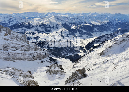 View from Mt Saentis of the wintery Thur Valley, Grisons Alps in the back, Canton of Appenzell Ausserrhoden, Switzerland, Europe Stock Photo