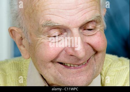 Elderly man having a conversation, smiling, Germany, Europe Stock Photo