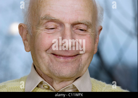 Elderly man having a conversation, grinning, Germany, Europe Stock Photo