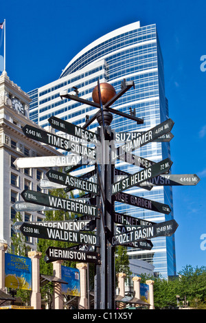 Street signs on Pioneer Courthouse Square, in the back the Fox Tower, Portland, Oregon, USA Stock Photo