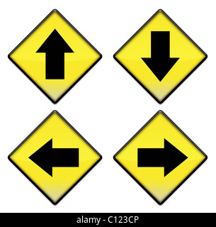 Group of four yellow road signs with pointing arrows Stock Photo