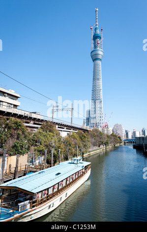 TOKYO, JAPAN - MARCH 3: Tokyo Sky Tree, scheduled for completion in 2012, becomes the world's tallest tower. Stock Photo