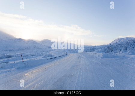 Icy road, South Klondike Highway, snow covered alpine landscape, White ...