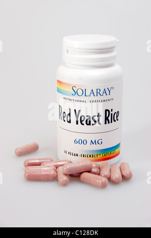 red yeast rice tablets a natural remedy to help reduce cholesterol levels Stock Photo