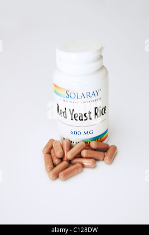 red yeast rice tablets a natural remedy to help reduce cholesterol levels Stock Photo