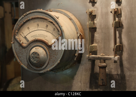 GE Amperes. General Electric Company ammeter. Beside is a Knife Switch. Stock Photo