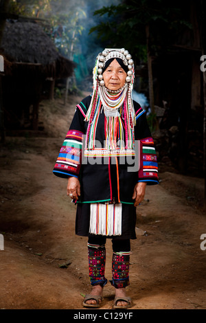 Akha woman traditional wearing dress at Ban Pilai, Chiang Dao, Chiang mai Stock Photo