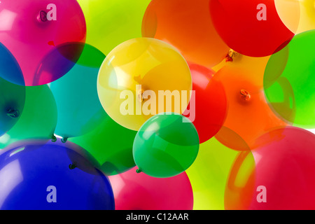 many colored balloons forming a bright background wallpaper image Stock Photo