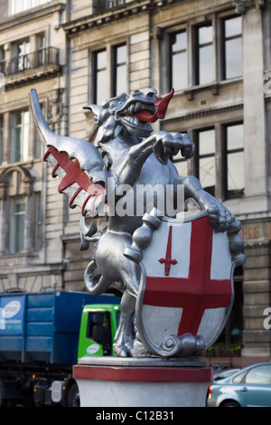 Griffen Dragon with saint Georges shield at the entrance to Tower Bridge London Stock Photo