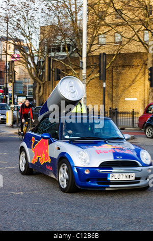 The Classic British Mini Advertising Red Bull on the streets of London Stock Photo