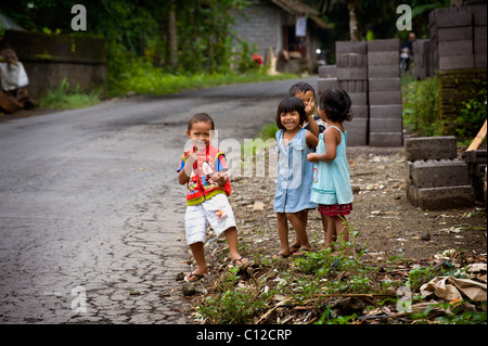 Smiling and happy Balinese children from a village in east Bali called Sideman. Stock Photo