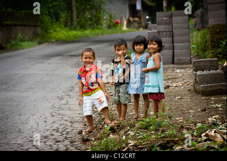 Smiling and happy Balinese children from a village in east Bali called Sideman. Stock Photo