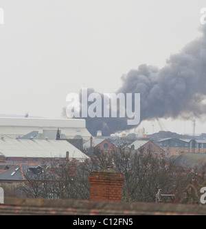 Large smoke pall drifting west over Cardiff Stock Photo