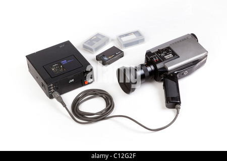 old video camera and portable sVHS video recorder Stock Photo