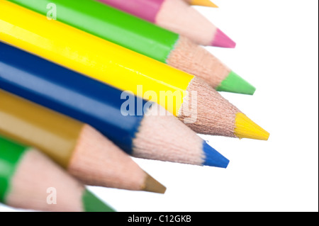 Close up of a set of colored pencils with the focus on the tip of the yellow pencil. Stock Photo