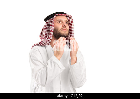 Young arab man of muslim religion praying Stock Photo
