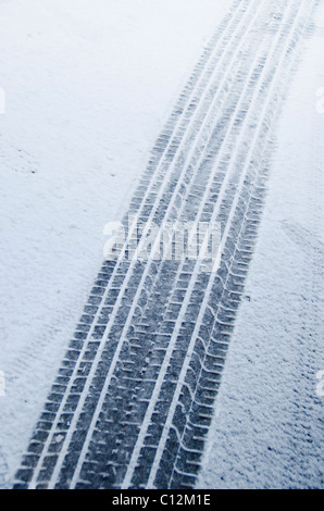 USA, New York City, Tire tracks in snow Stock Photo