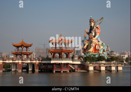 Statue of Taoist God Xuan-tian-shang-di on Lotus Lake Stock Photo