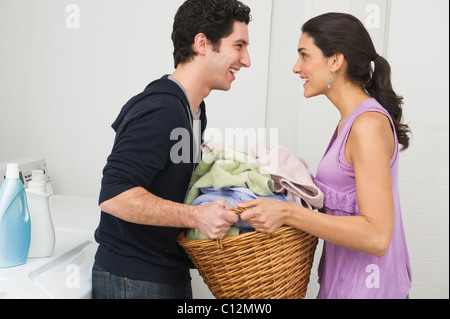 USA, New Jersey, Jersey City, couple doing laundry Stock Photo