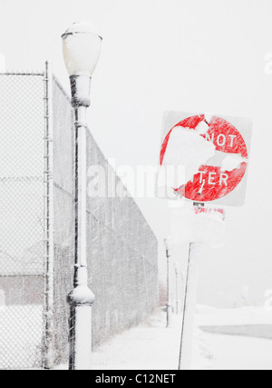USA, New York State, Rockaway Beach, Do Not Enter Sign covered with snow Stock Photo