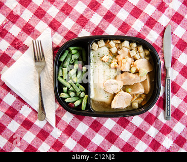 USA, New Jersey, Jersey City, close up of TV dinner on checked table cloth Stock Photo