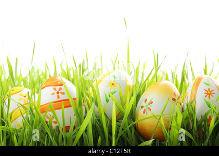 Row of Easter eggs in Fresh Green Grass Stock Photo