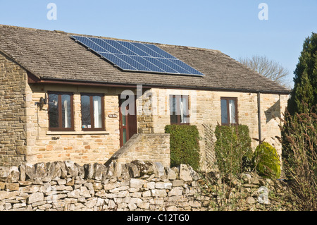 Solar panels on a modern bungalow in Yorkshire, UK Stock Photo