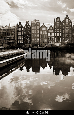 Canal Boat in Amsterdam. Black and White view on Cruise Boat at Nieuwe ...