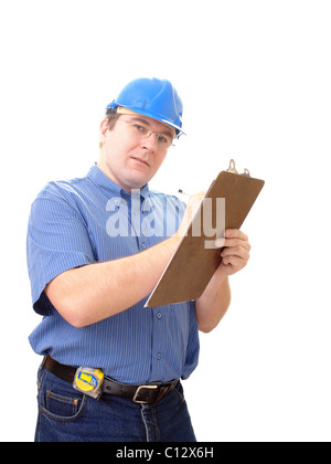 Civil engineer wearing blue helmet taking notes on notepad over white Stock Photo