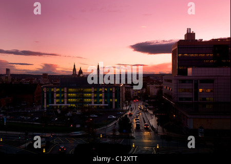 Leeds town hall and civic hall on the skyline of Leeds city centre at sunset Yorkshire UK Stock Photo