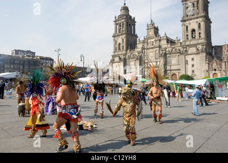 Indigenous Aztec Dancers Perform in the Zocalo Historic Center Square Outside the Metropolitan Cathedral, Mexico City, Mexico Stock Photo