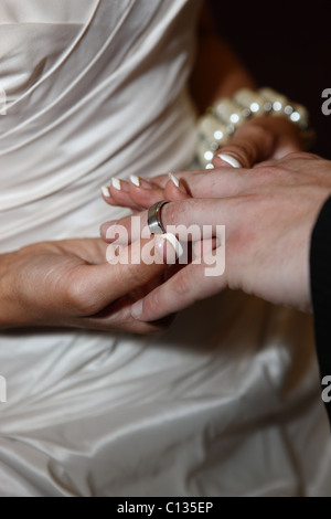 Exchange of rings during a wedding ceremony. Stock Photo