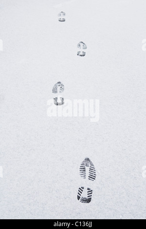 USA, New Jersey, footprints on snow Stock Photo