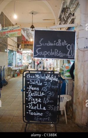 Restaurant signs inside Marche Central the central market new town Casablanca central Morocco northern Africa Stock Photo