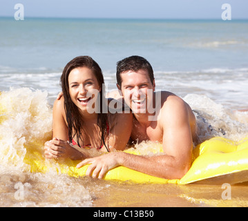 Young couple on beach holiday Stock Photo