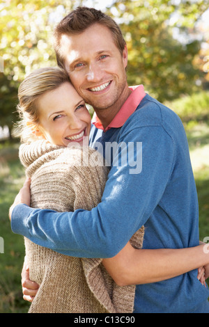 Young couple posing in park Stock Photo
