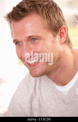 Young man poses in studio Stock Photo