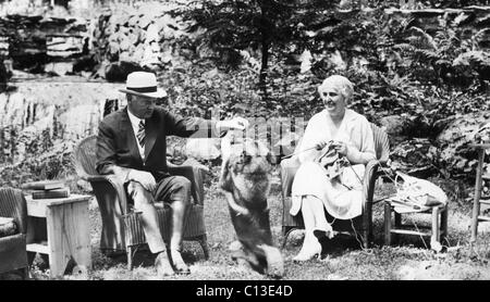 President Herbert Hoover, First lady Lou Henry Hoover, and their norwegian elkhound, August, 1932. Stock Photo